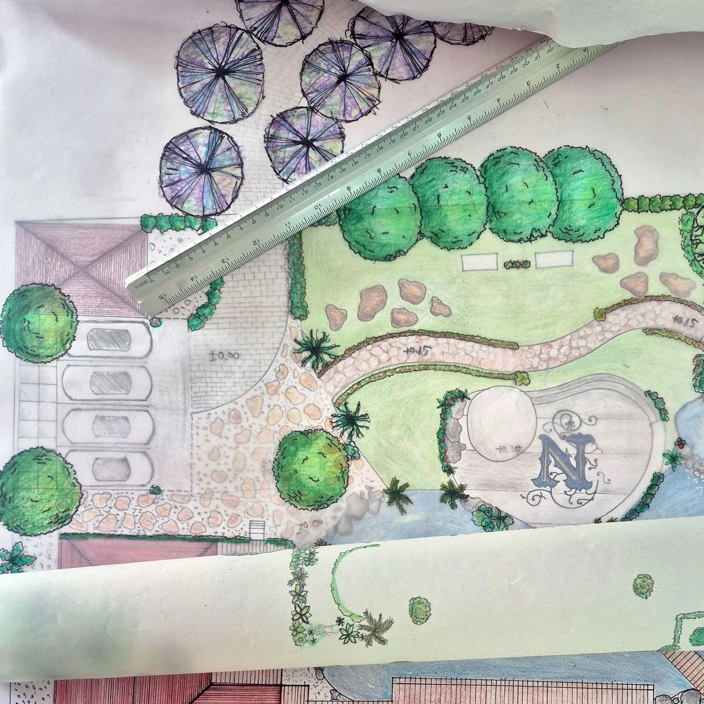 Hand-drawn landscape plan and scale ruler used in the design process